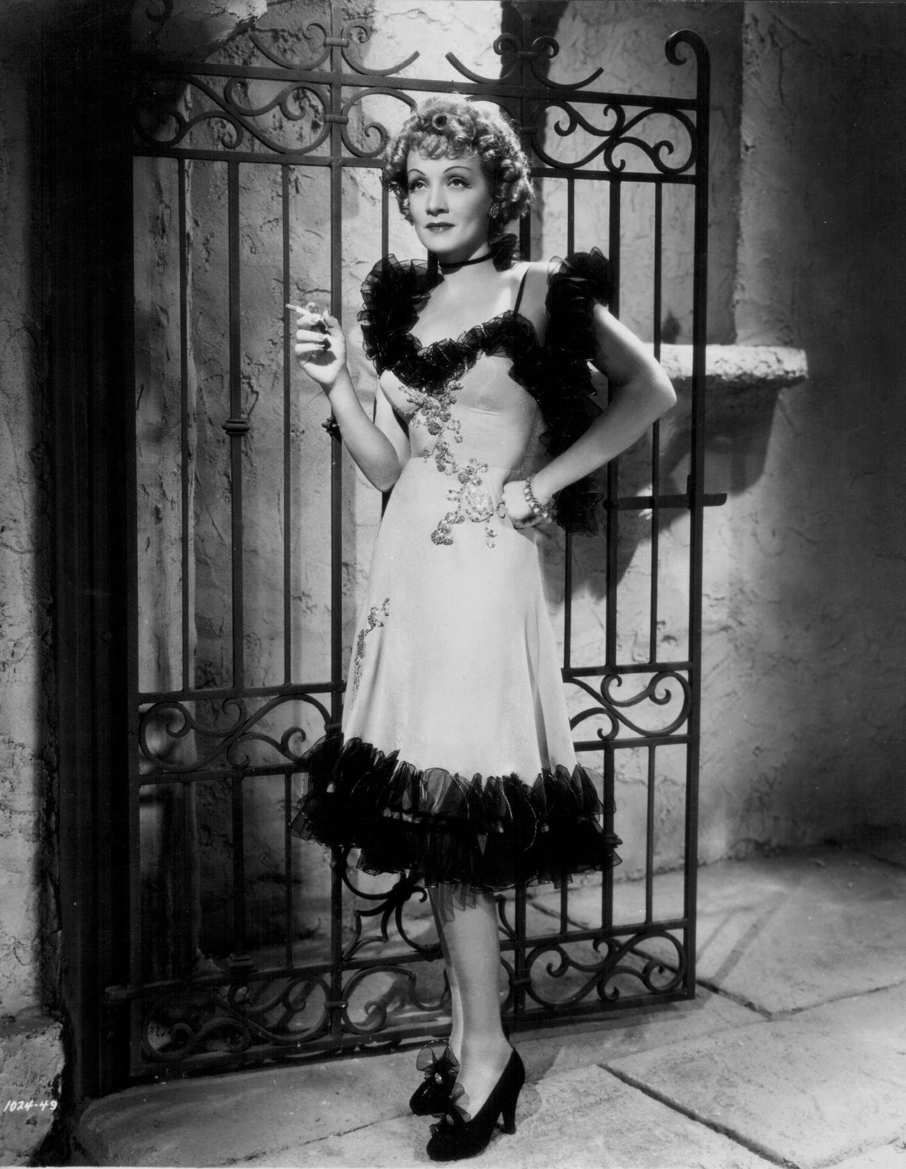 Marlene Dietrich, Wearing A Saloon Girl Costume And Holding A Cigarette, As She Appears In The Movie 'Destry Rides Again', 1939