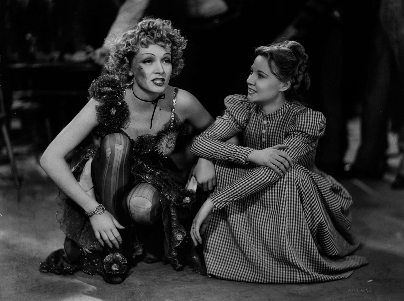 Marlene Dietrich And Una Merkel On The Set Of The Classic Western 'Destry Rides Again'.
