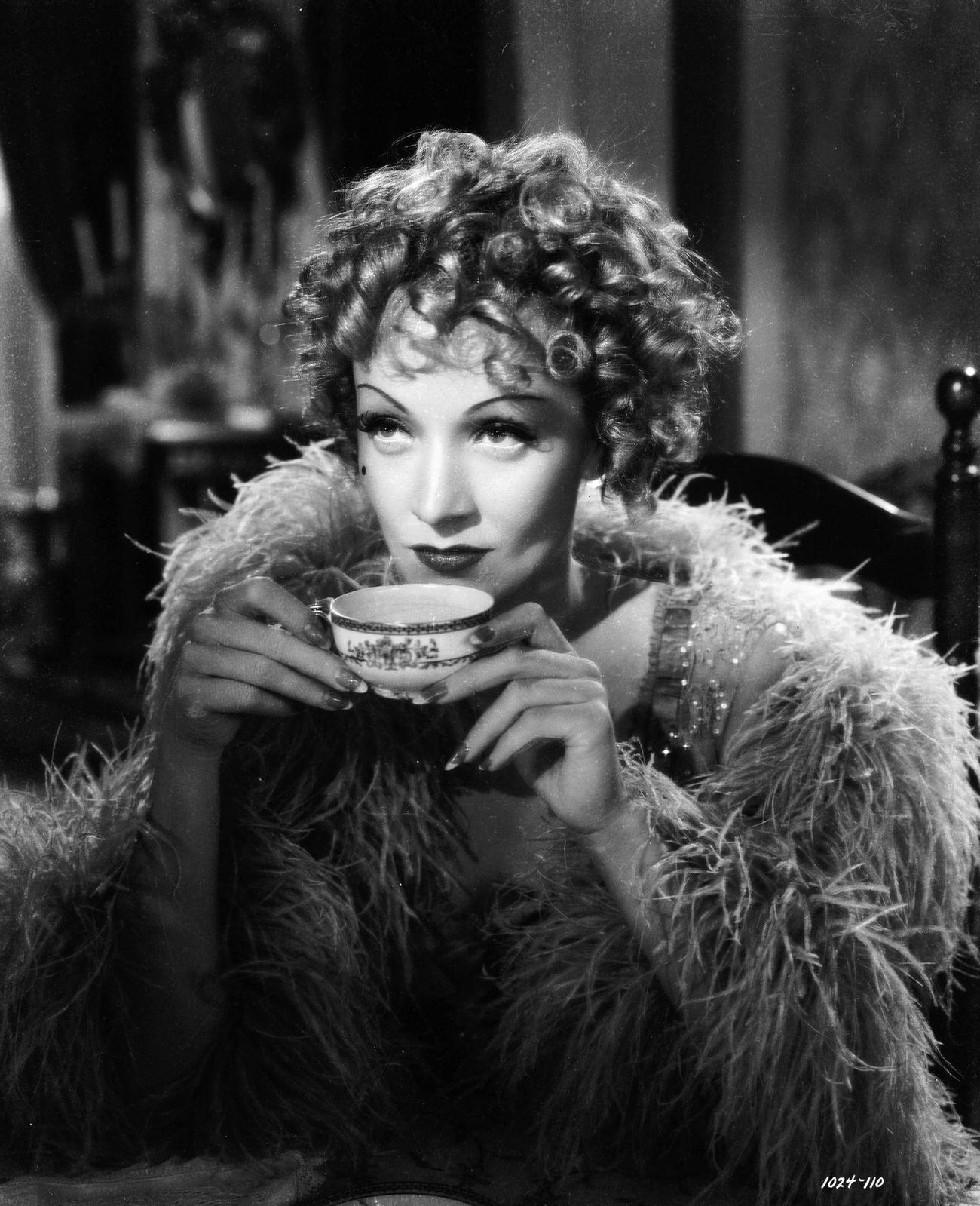 Marlene Dietrich Sips A Cup Of Tea.