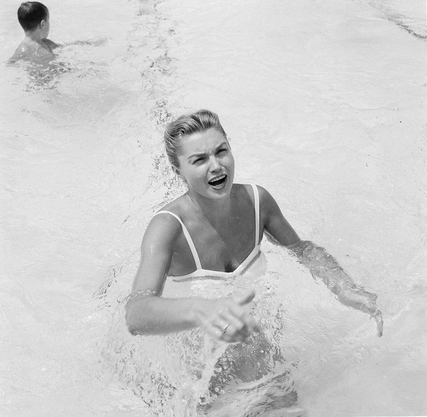 Esther Williams Stands In The Pool At Swim School Opening In Los Angeles On August 12, 1955