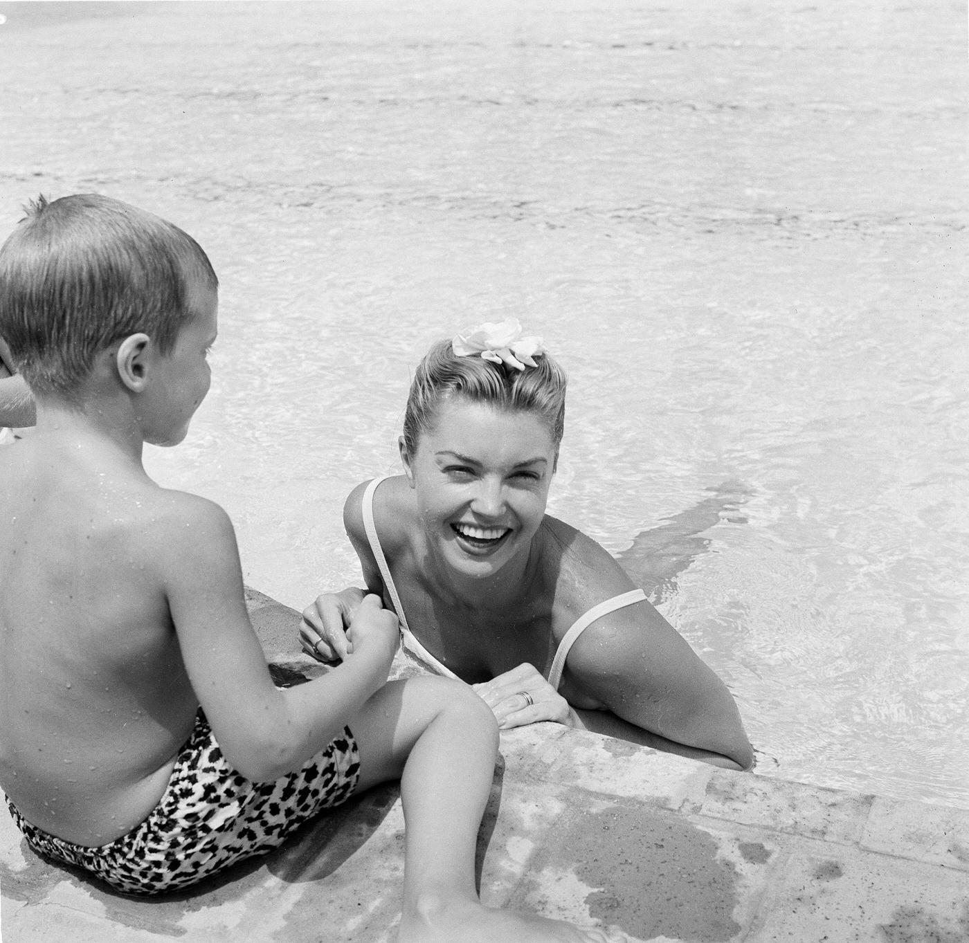Esther Williams Poses In The Pool At Swim School Opening In Los Angeles On August 12, 1955