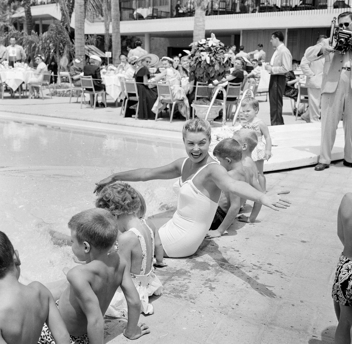 Esther Williams Sits With Children At Swim School Opening In Los Angeles On August 12, 1955
