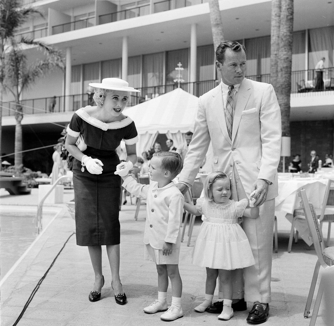 Celeste Holm And Children Attend Swim School Opening In Los Angeles On August 12, 1955