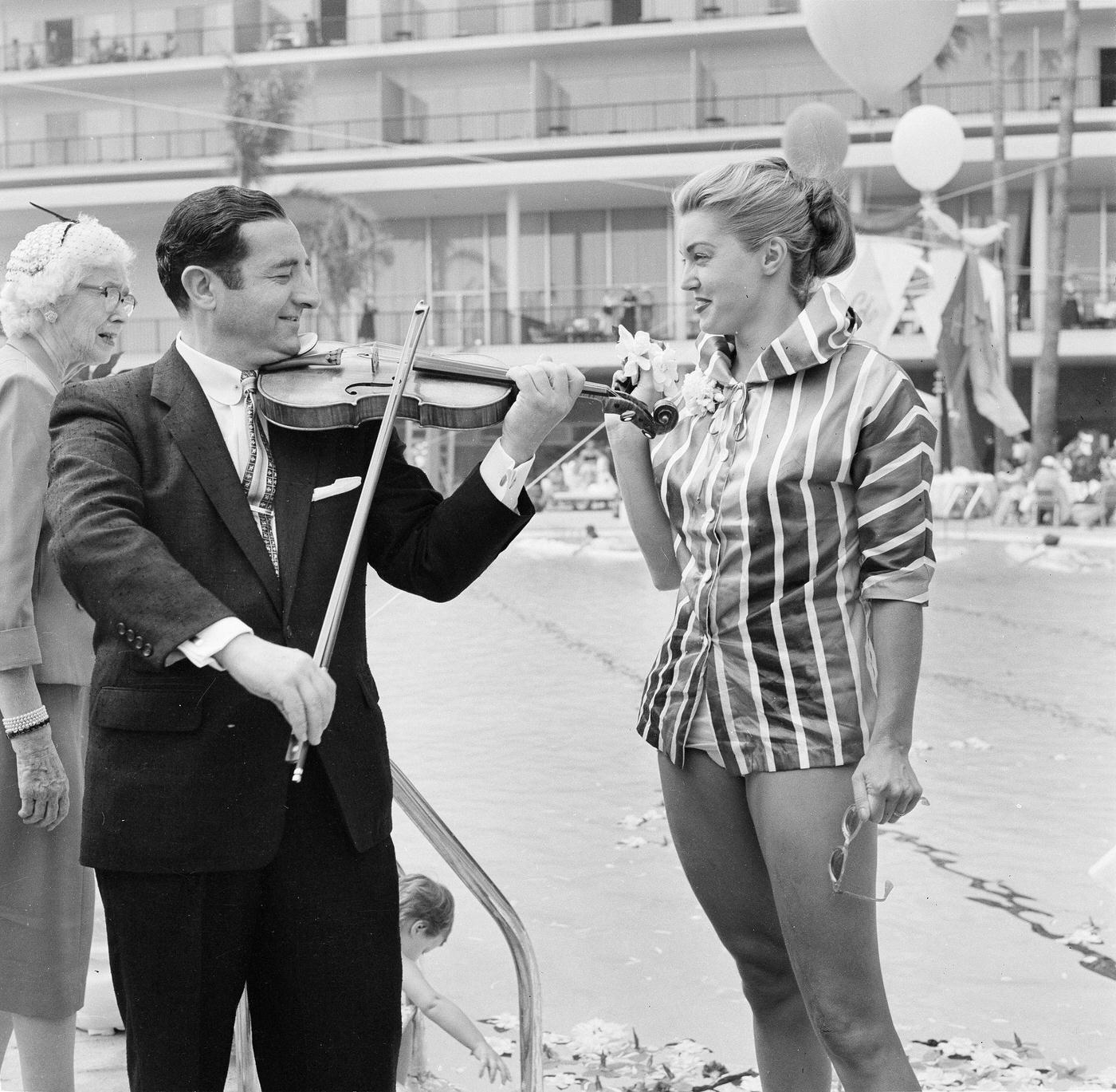 Esther Williams Serenaded At Swim School Opening In Los Angeles On August 12, 1955