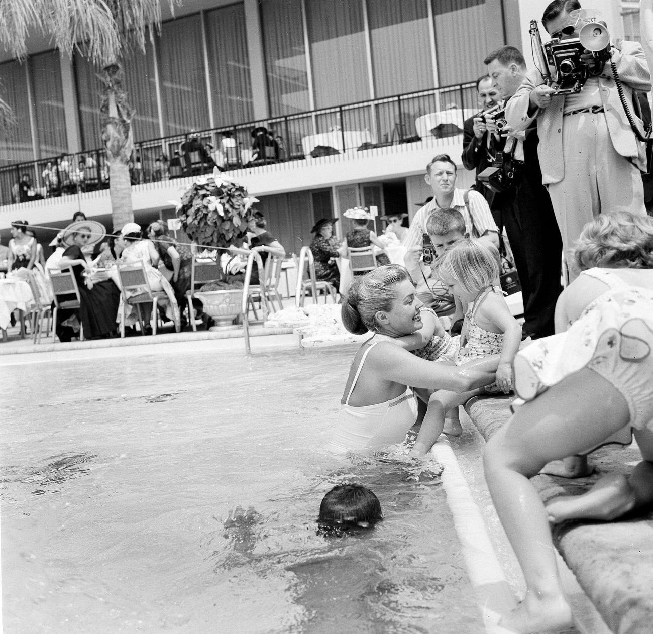 Esther Williams In The Pool With Children During The Opening Day Of The Esther Williams Swim School At The Hilton Hotel In Los Angeles.