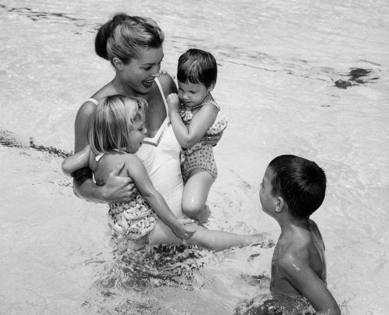 Esther Williams, Playing With Her Three Children, Susan, Kimball And Ben, In A Pool, 1955