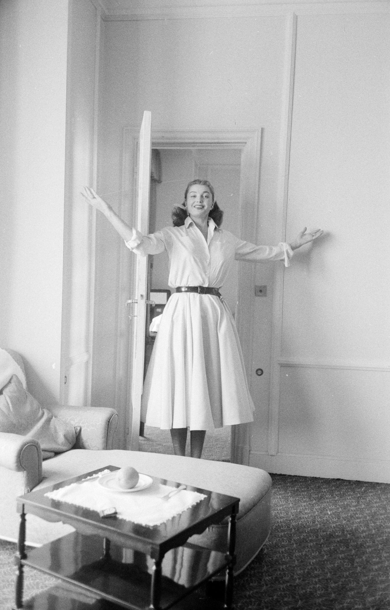 Esther Williams Smiling And With Open Arms In Her Carlton Hotel Suite