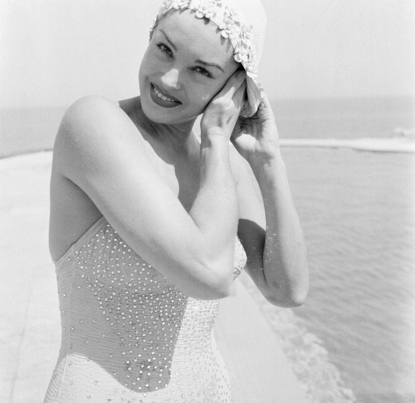 Esther Williams Smiling And Putting Her Hair Under Her Swimming Cap, Standing By The Pool At Her Friends Dubonnet'S Home In Cap D'Antibes