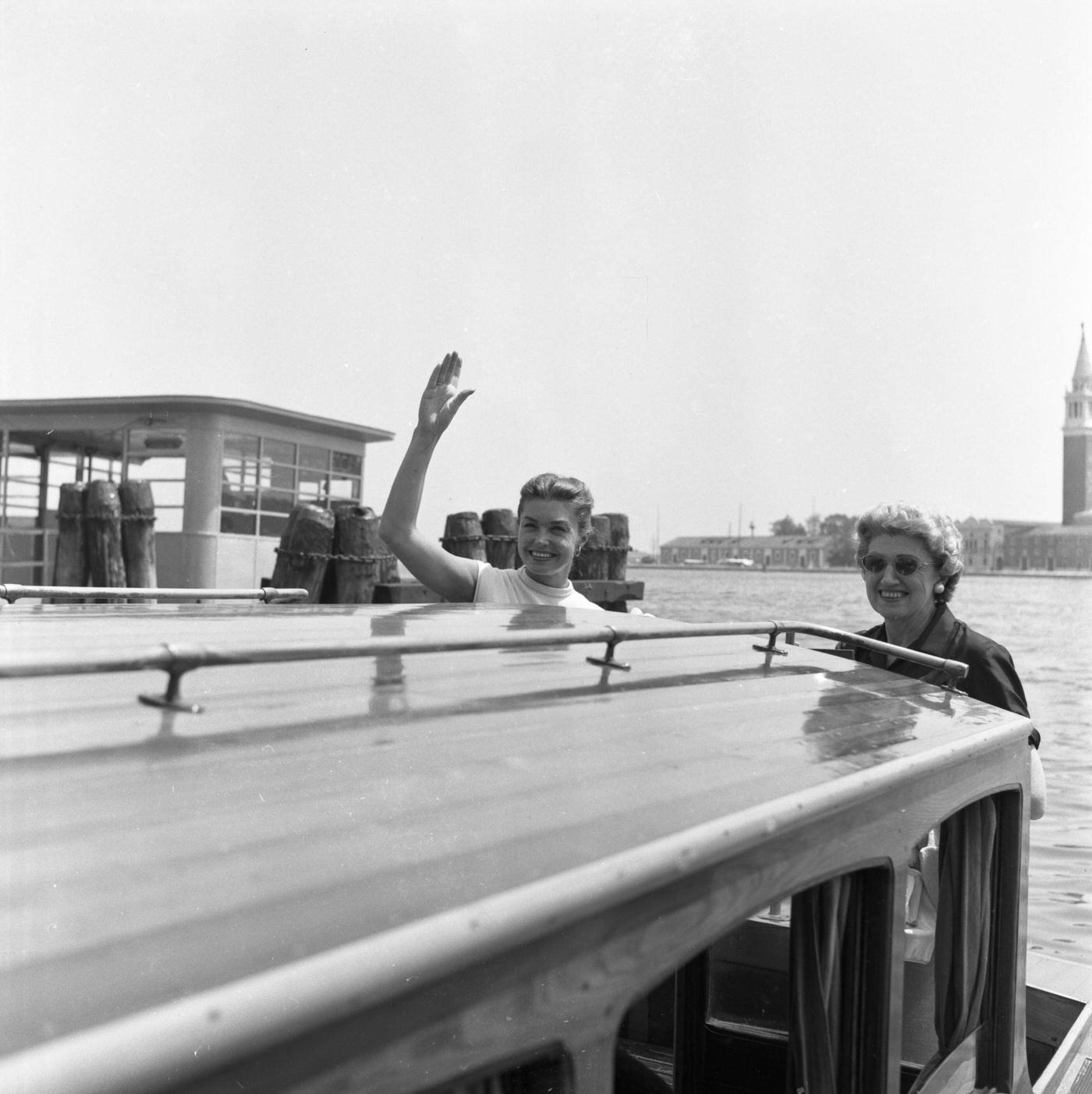 Esther Williams Waves From A Taxi Boat In Venice, Italy, September 1957