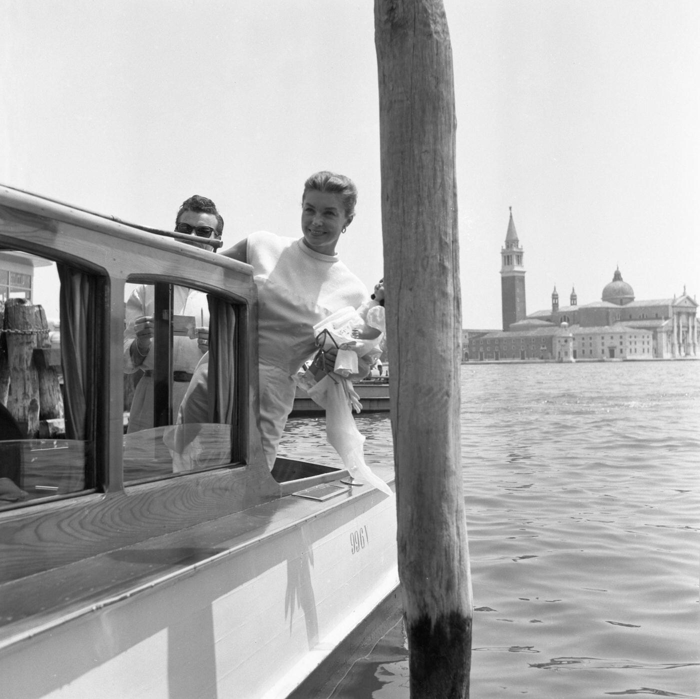 Esther Williams Waves From A Taxi Boat In Venice, Italy, September 1957
