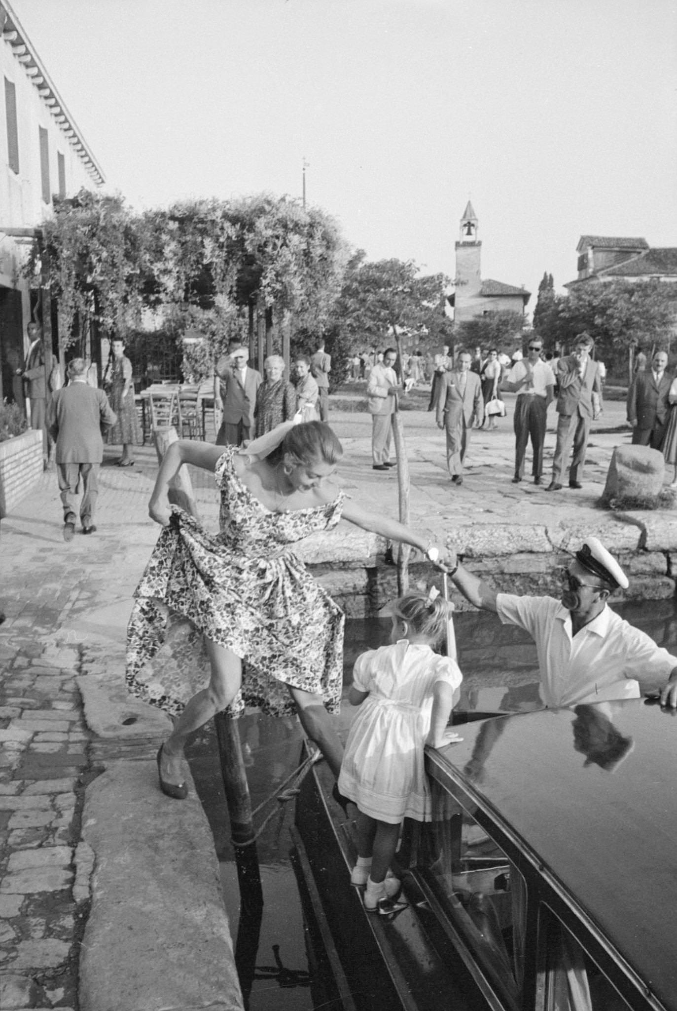 Esther Williams Being Helped Getting On A Boat During The Xviii Venice International Film Festival. Venice, 1957