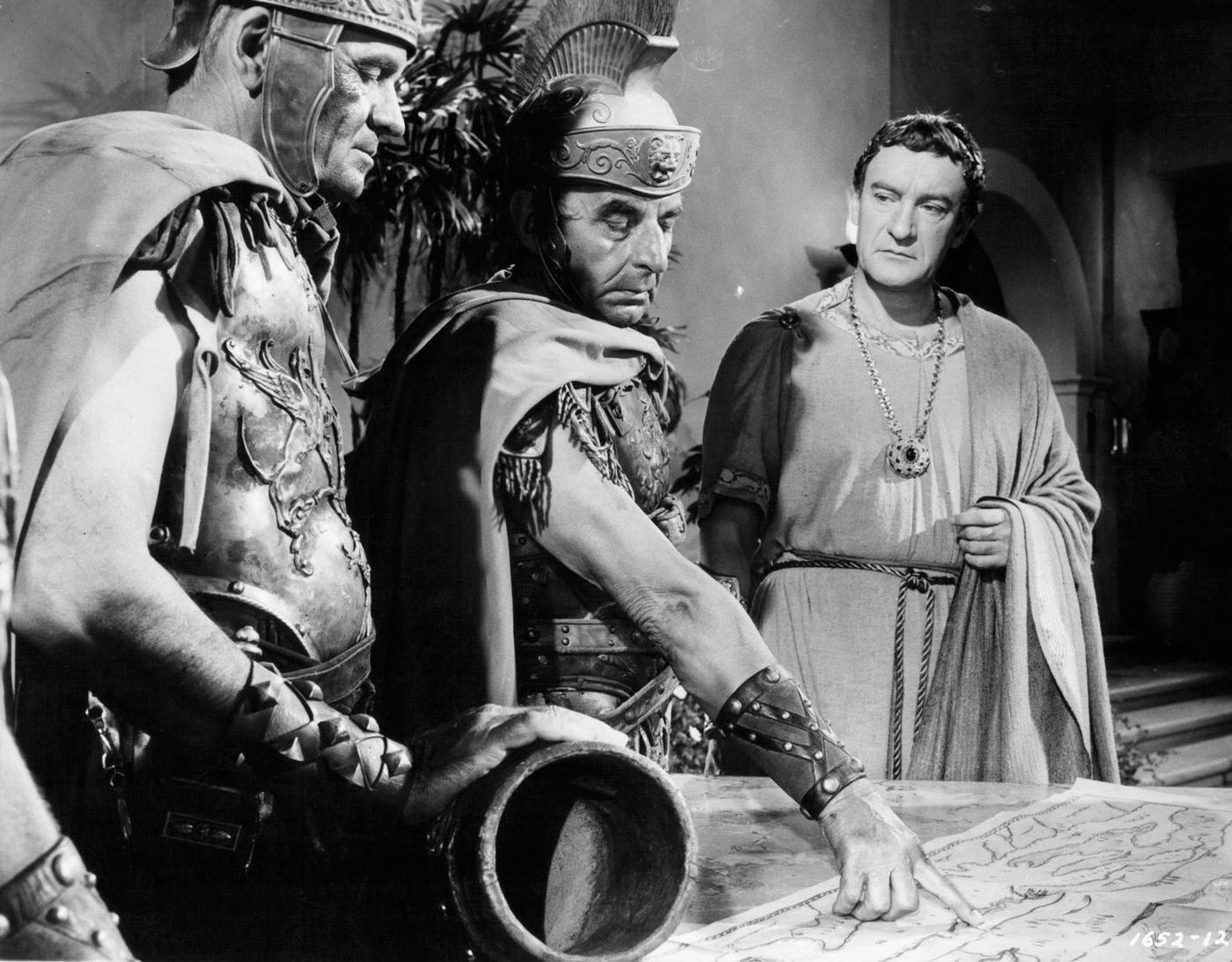 George Sanders Watching Soldiers Pointing To Map In A Scene From The Film 'Jupiter'S Darling', 1955