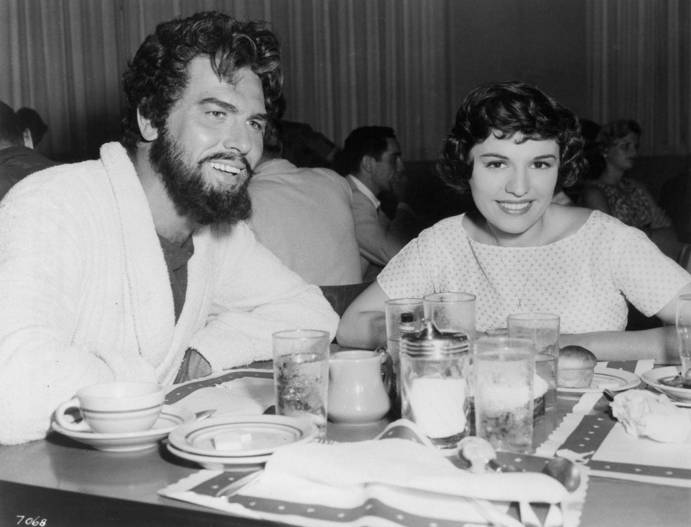 Howard Keel Has Lunch With A Woman In Publicity Portrait For The Film 'Jupiter'S Darling', 1955