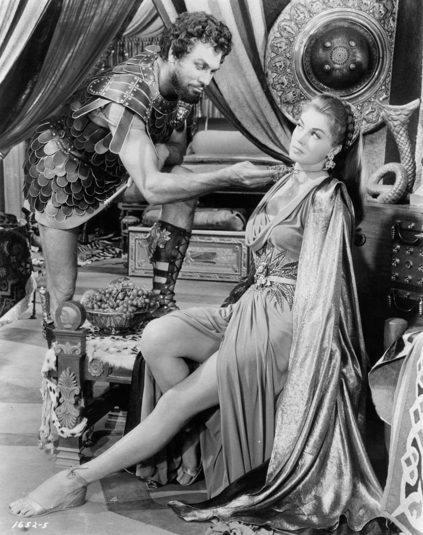 Howard Keel Tugs On Esther Williams' Necklace In A Scene From The Film 'Jupiter'S Darling', 1955