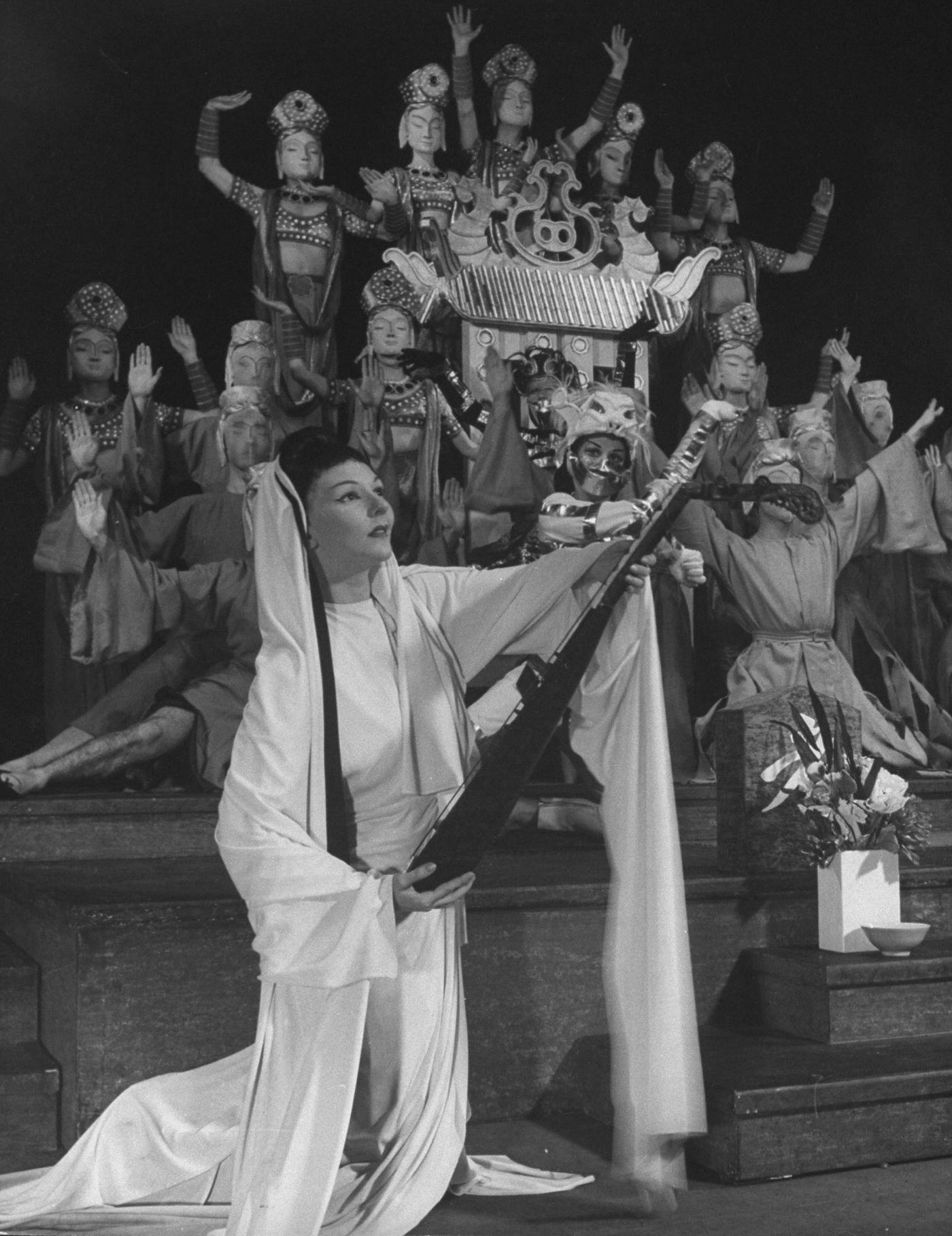 Mary Martin In Costume &Amp;Amp; Holding Lute As Troupe Of Costumed Performers Stand On Stage For Production Of The Lute Song.