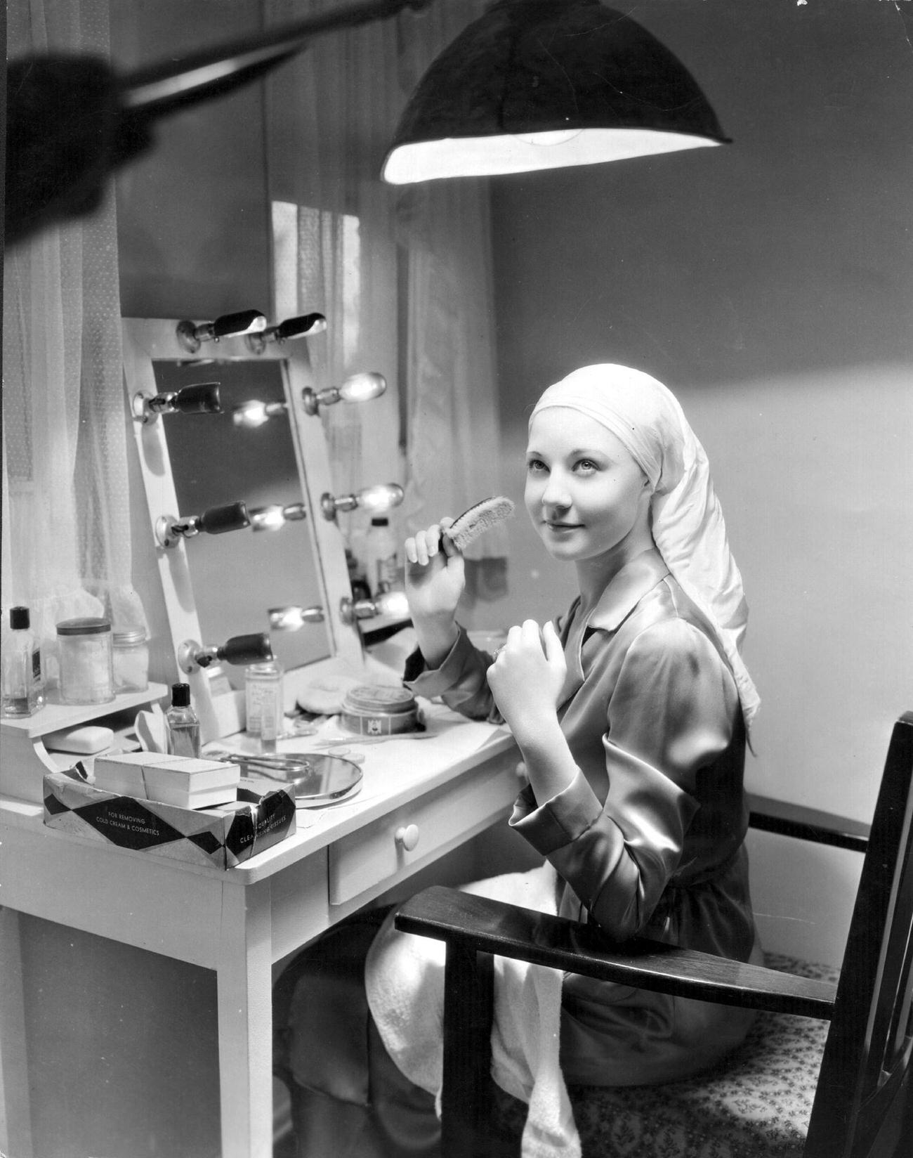 Una Merkel Seated At Her Dressing Table.