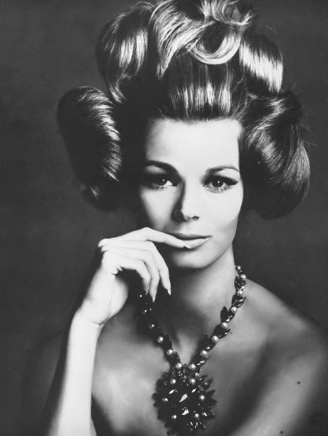 Anne De Zogheb'S Coiffure Is By Carita, Pendant Star Of Amethyst And Pearls On Leafy Chain Of Same Is By Scémama For Saint Laurent, Vogue, November 1, 1962
