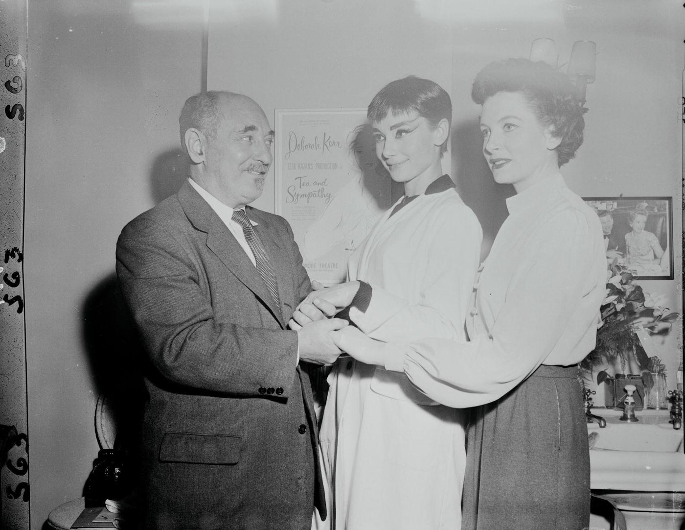 Audrey Hepburn, With Deborah Kerr, Sharing Hand Clasp During Award