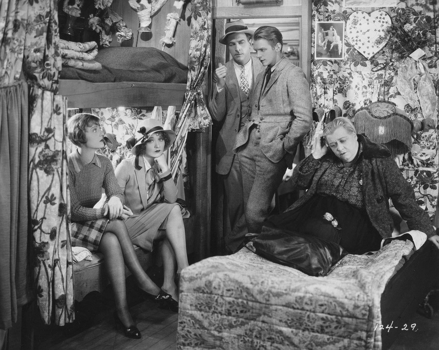 Dorothy Mackaill As Lou, Betty Compson As Carrie, Milton Sills As Nifty Miller, Douglas Fairbanks, Jr. As Chris Miller, And Sylvia Ashton As Ma Benson In The 1928, The Barker