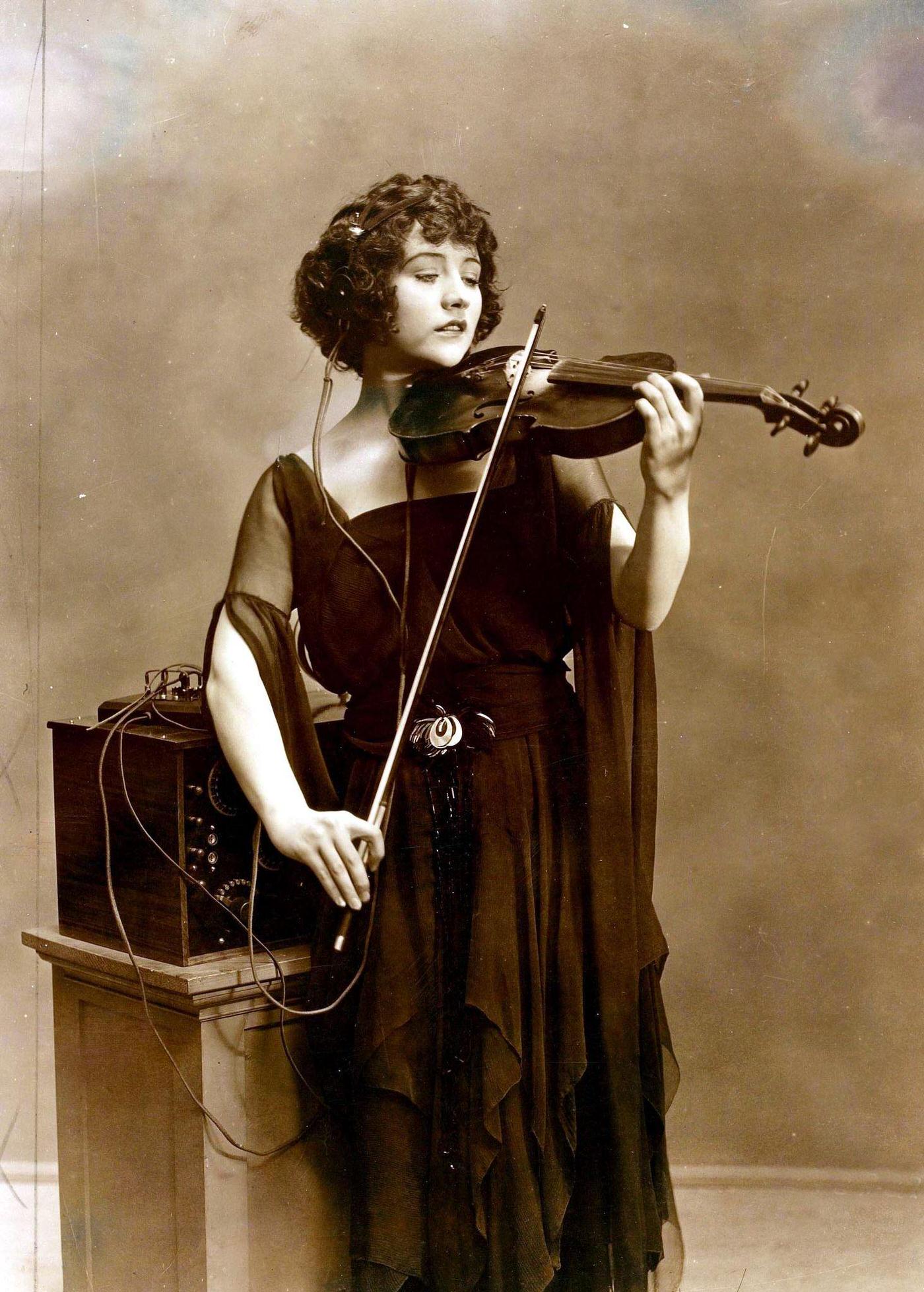 Betty Compson Relaxes As She Plays Her Violin In Hollywood, 1929