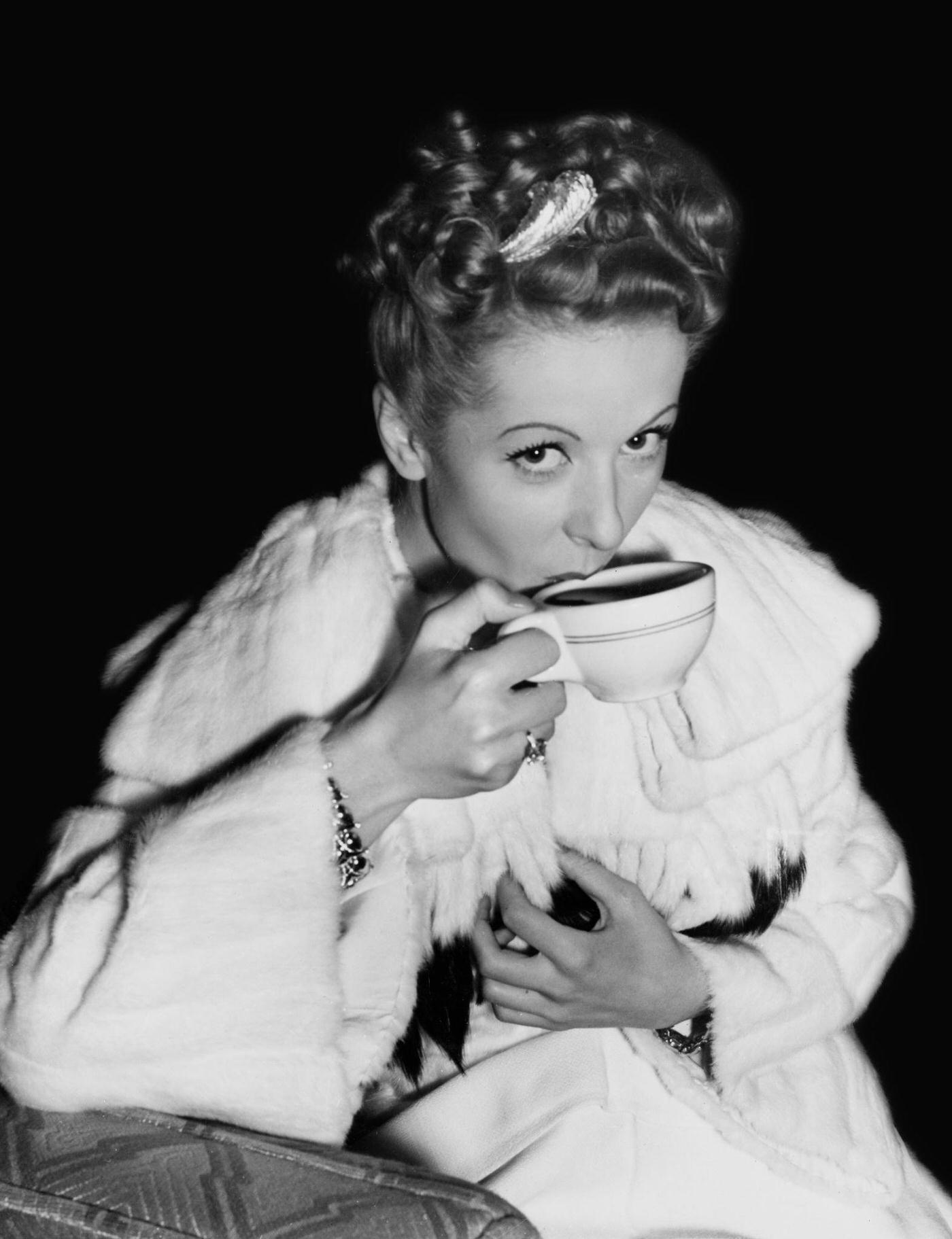 Danielle Darrieux Takes Coffee On The Set Of The Universal Pictures Film 'The Rage Of Paris', 1938