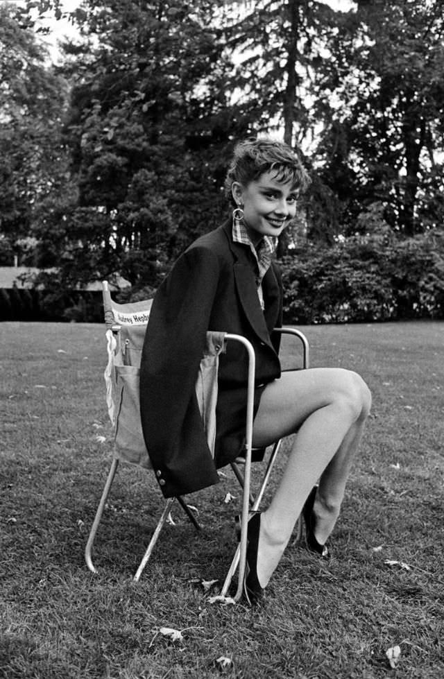 Audrey Hepburn Wearing Humphrey Bogart'S Jacket Takes A Break On The Set Of ‘Sabrina’, Long Island, New York, 1954