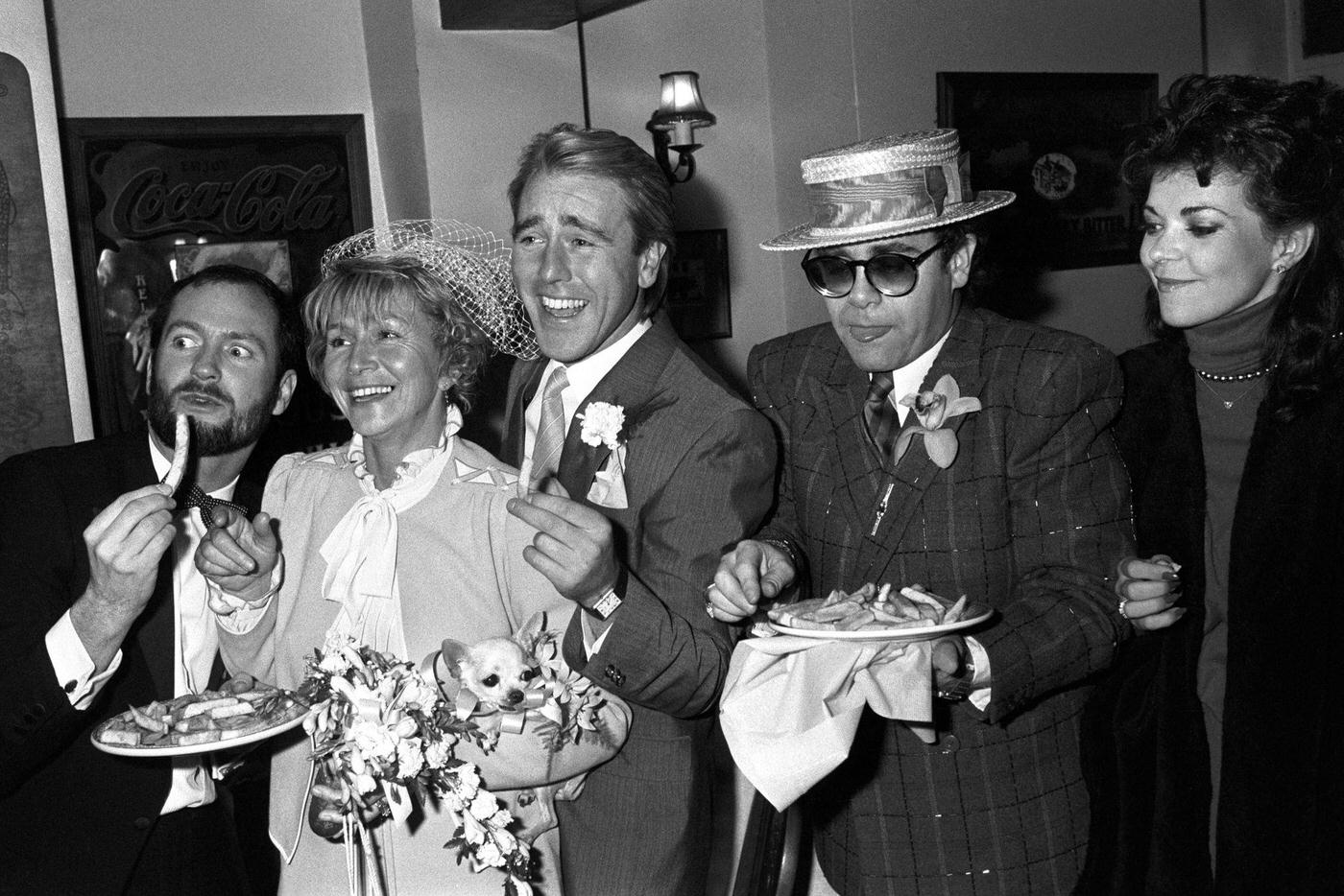 Elton John And His Wife Renate Blauel At Fish And Chip Restaurant For The Wedding Reception Of Former Lee Everett
