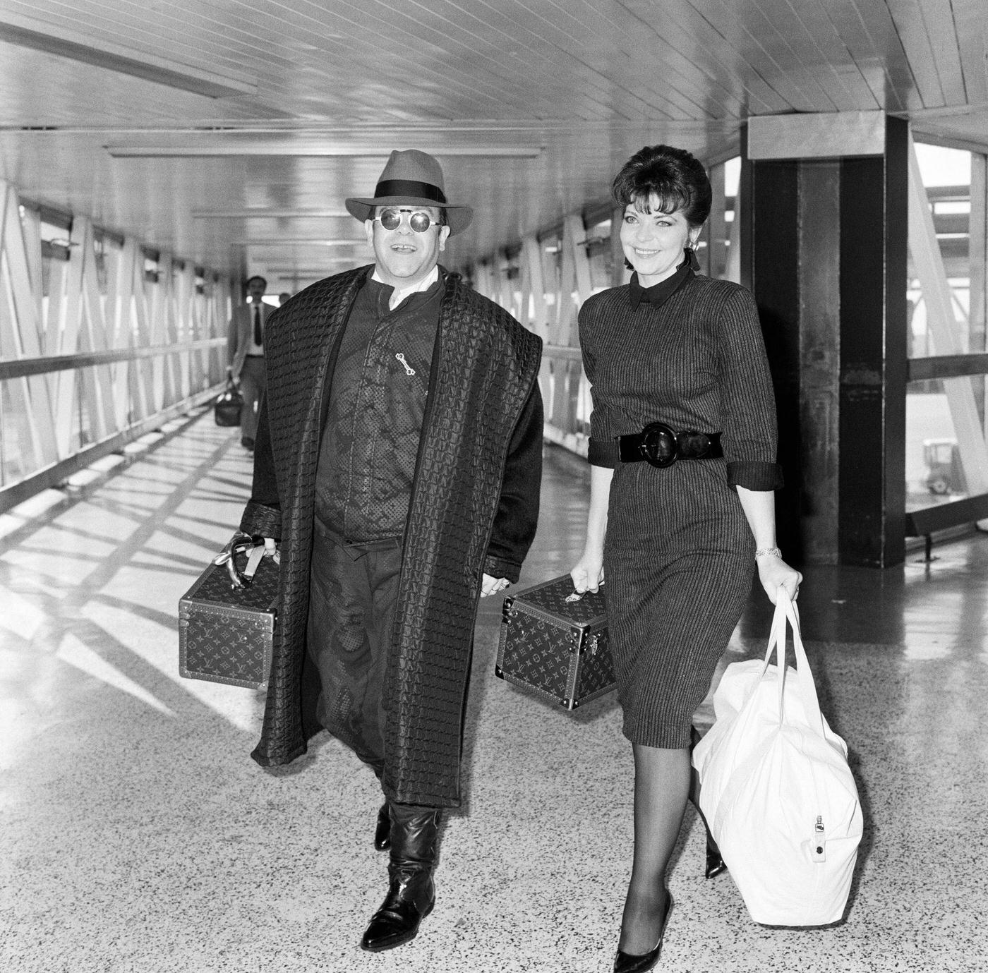 Elton John And Renate Arriving From Los Angeles At London Airport, 17Th October 1986.
