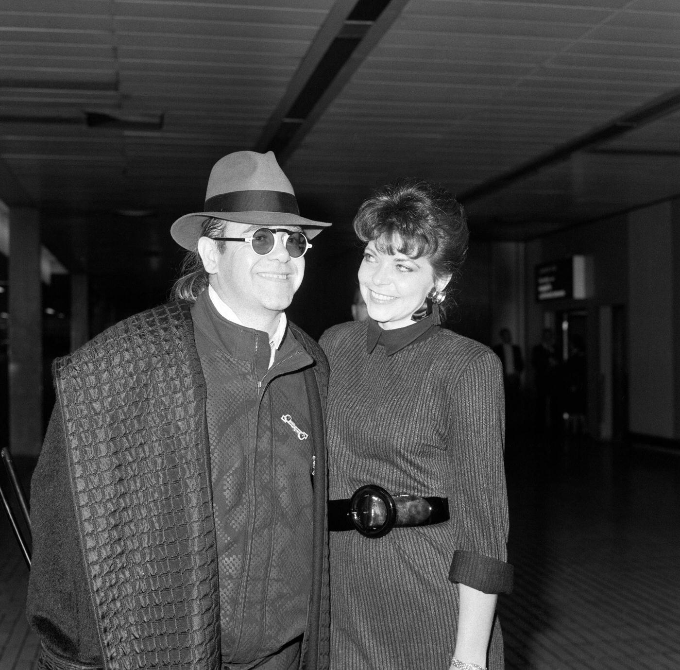 Elton John And Renate Arriving From Los Angeles At London Airport, 17Th October 1986.