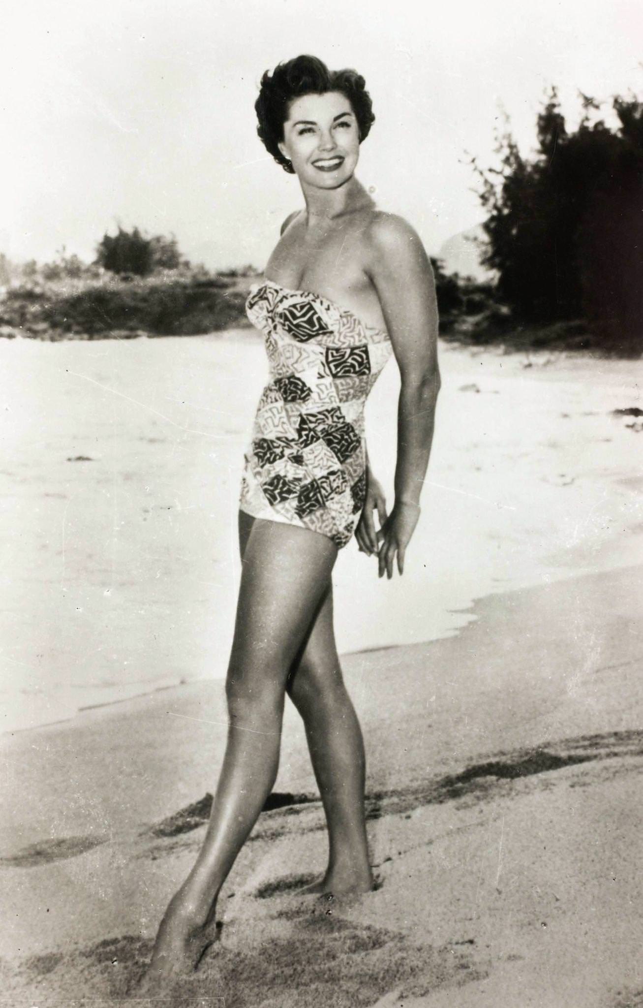 Esther Williams, Whose Youth Was Spent As A Teenage Swimming Champion, Posed Standing On A Beach Wearing A Swimming Costume, 1942