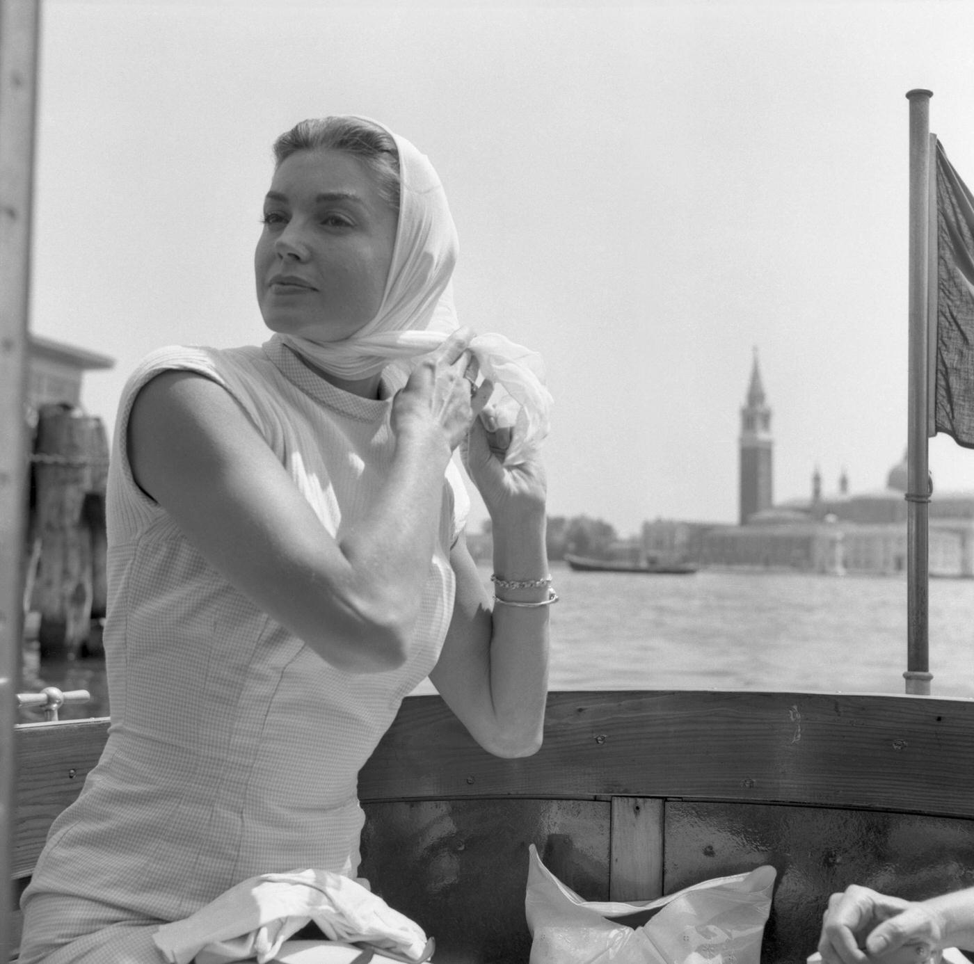 Esther Williams, Wearing A A Vichy Dress And A Foulard On Her Hair, Portrayed While Sitting On A Boat, Canal Grande, Venice 1945.