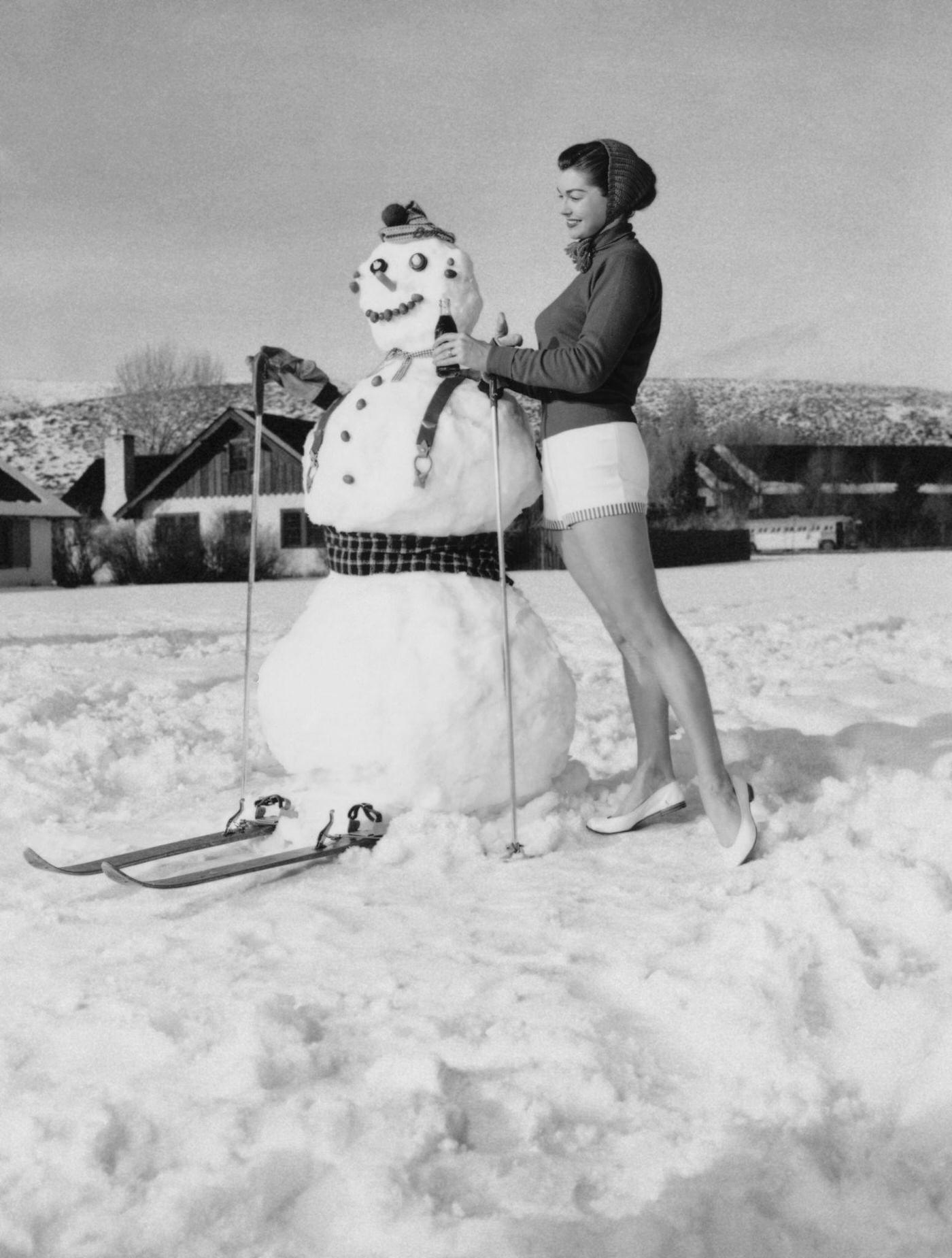 Esther Williams Builds A Snowman In Sun Valley, Idaho, 1St January 1954.