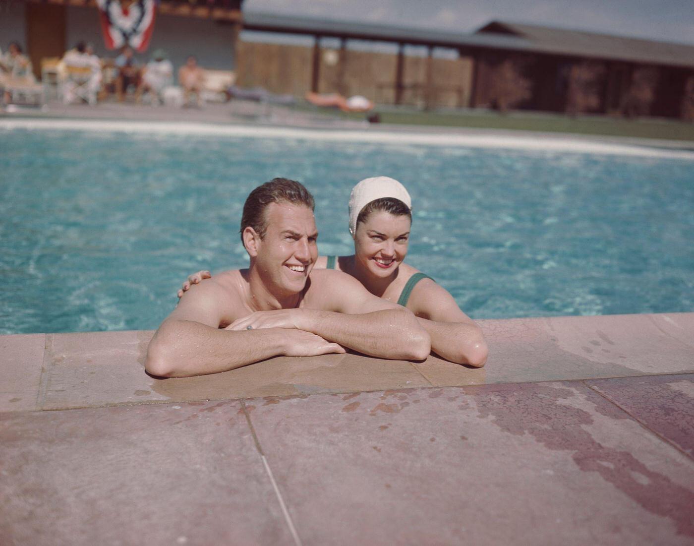 Esther Williams In A Swimming Pool With Her Husband, Actor Ben Gage, 1950
