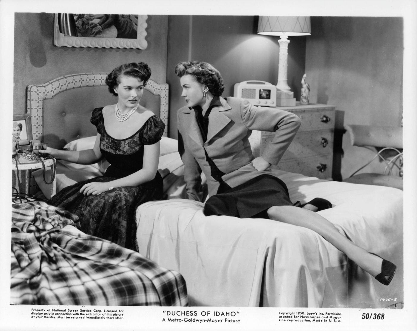 Esther Williams Talks On Bed With Unknown Actress In A Scene From The Film 'Duchess Of Idaho', 1950.