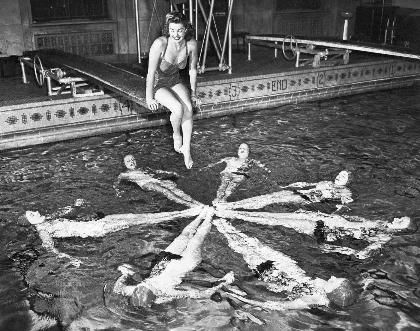 Esther Williams Sitting Above Swimmers