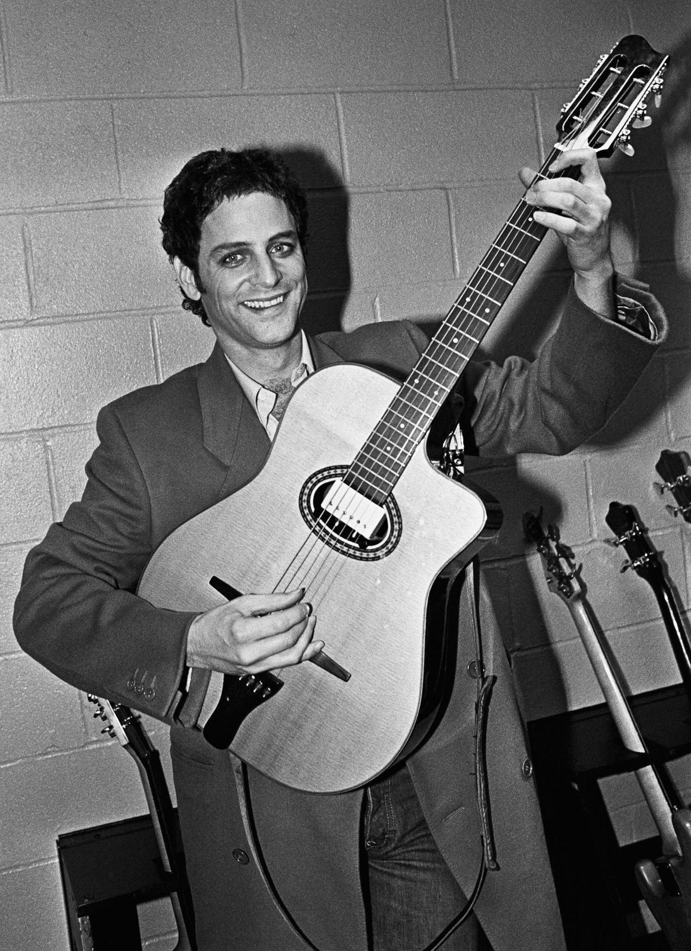 Lead Guitarist Of Fleetwood Mac, Lindsey Buckingham, Poses With His Guitar In A Backstage Portrait Session Just Prior To A 1979 Concert At Madison Square Gardens In New York.