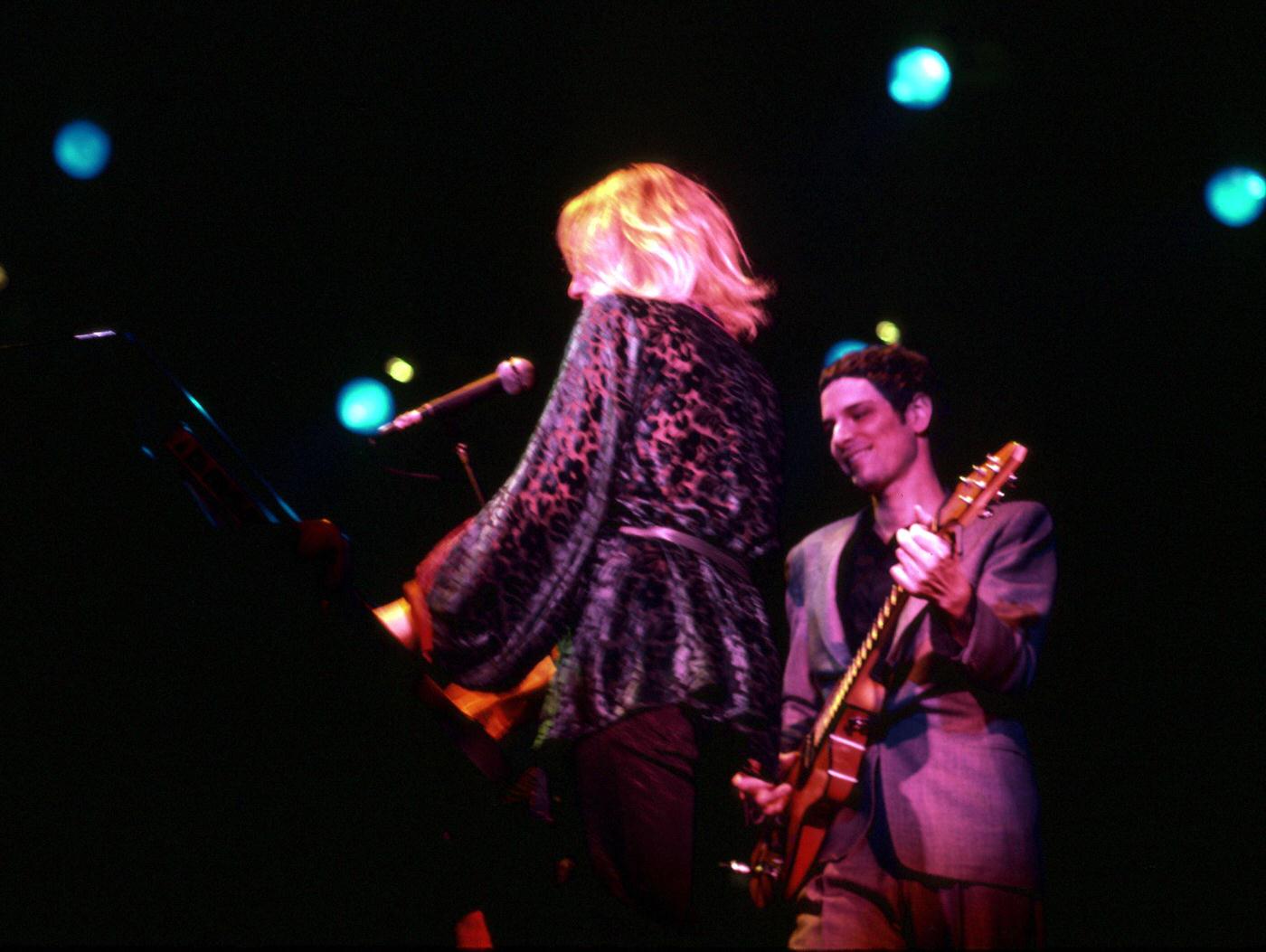 Singer Stevie Nicks And Guitarist Lindsey Buckingham Of The Rock Group &Amp;Quot;Fleetwood Mac&Amp;Quot; Perform Onstage In October 1977.