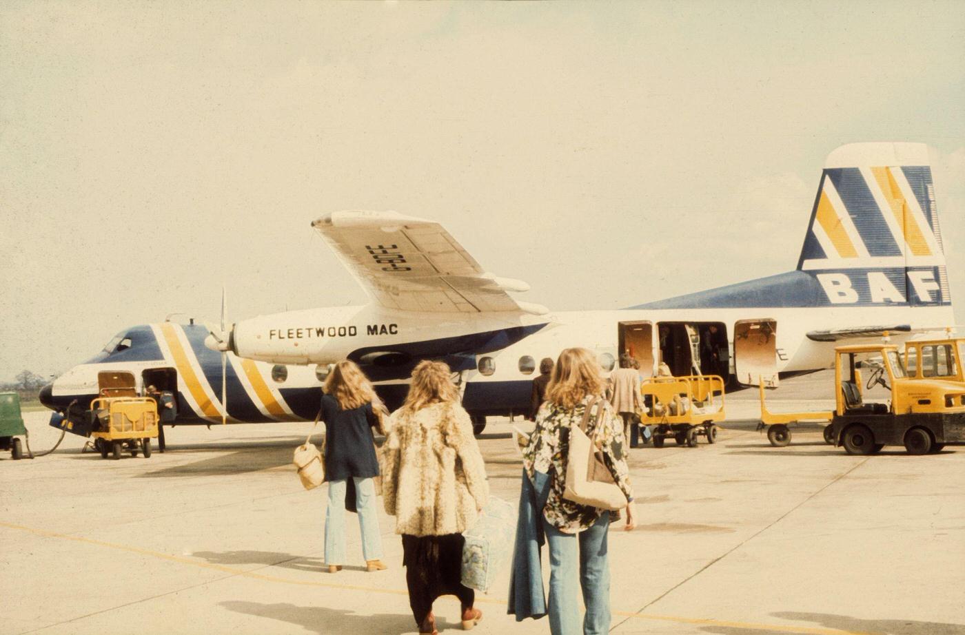 Rock Group 'Fleetwood Mac' Boards Their Private Jet In 1975.