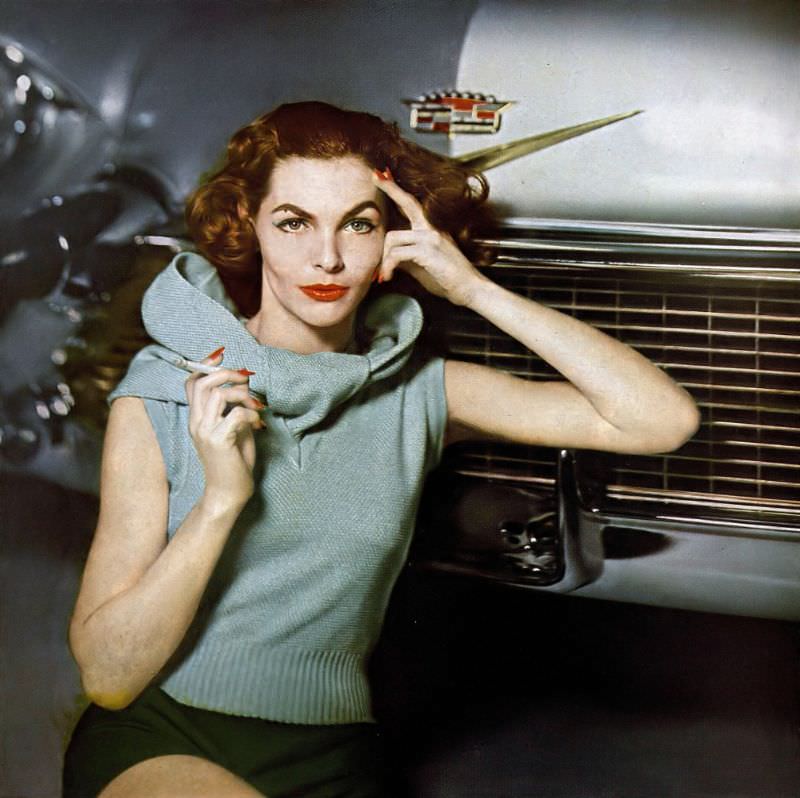 Georgia Hamilton In Pure Silk Sleeveless Sweater Worn With Its Matching Cardigan Tied Around The Shoulder By Braemar, Linen Shorts By Leon Levin, Harper'S Bazaar, May 1957