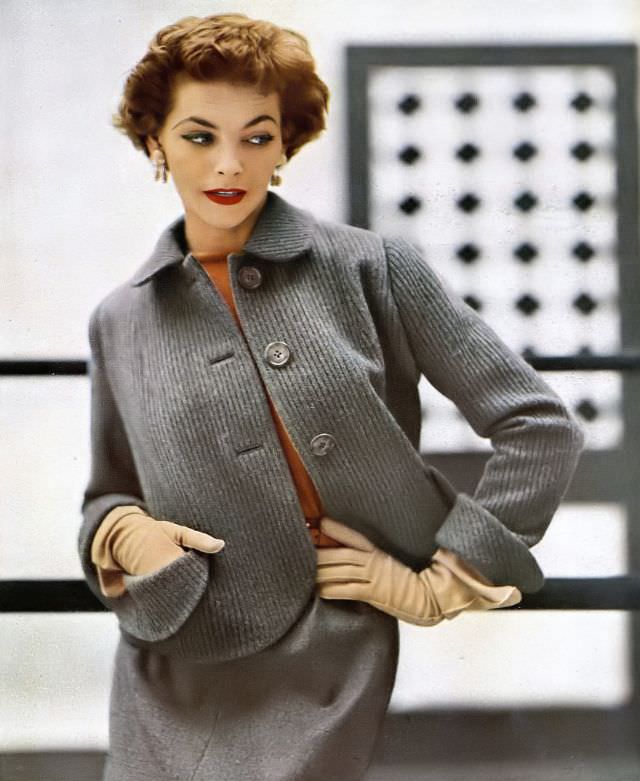 Georgia Hamilton In Heavy Ribbed Wool Jacket Worn With Gray Flannel Skirt, Gold Pine Cone Earrings By Black, Starr &Amp;Amp; Gorham, Ektachrome By Lillian Bassman, Harper'S Bazaar, September 1951
