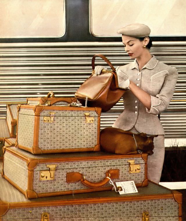 Eva Gerney In Suit Of Forstmann Wool Mixed With Silver Thread By Branell, Beret By John-Frederics, Llama Calf Bag By Coblentz, Wings Heirloom Luggage, Harper'S Bazaar, December 1953