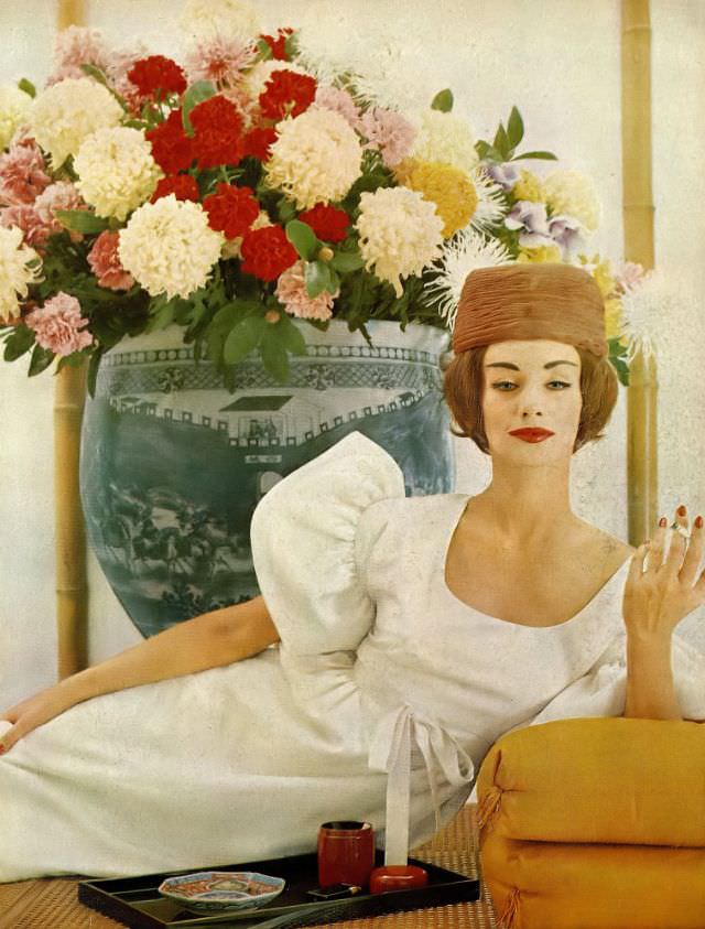 Ruth Neumann Derujinsky In Ivory-White Silk Tussah Dress, The Sleeves Flounce Out And The Waist Is Tied With Matching Ribbon By Larry Aldrich, Organdy Toque By Walter Florell, Harper'S Bazaar, April 1959