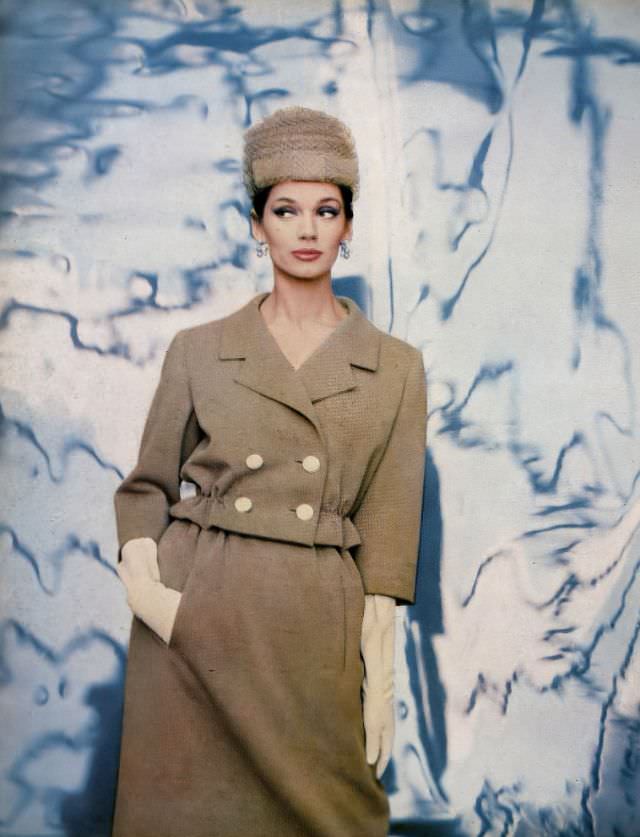 Simone D'Aillencourt In Nut-Beige Wool Jersey Suit, The Short Jacket Has Elasticized Waist Above Slender Gathered Skirt By Ben Zuckerman, Hat By Lilly Daché, Harper'S Bazaar, February 1959