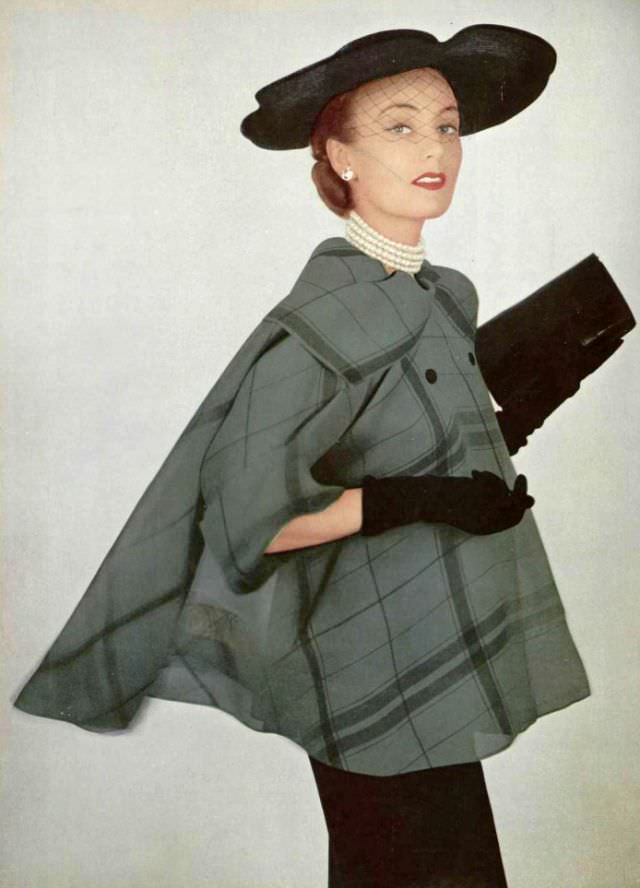 Model In Figure-Hugging Black Dress Worn With Light Sheer Organza Plaid Jacket By Grés, Hat By Gilbert Orcel, 1951