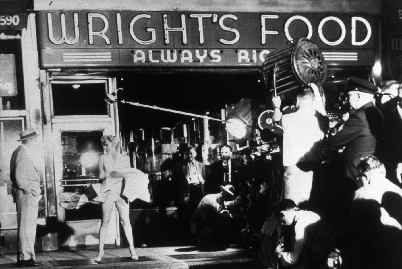 Marilyn Monroe With The Skirt Of Her White Dress Blowing As She Stands Over A Subway Grate