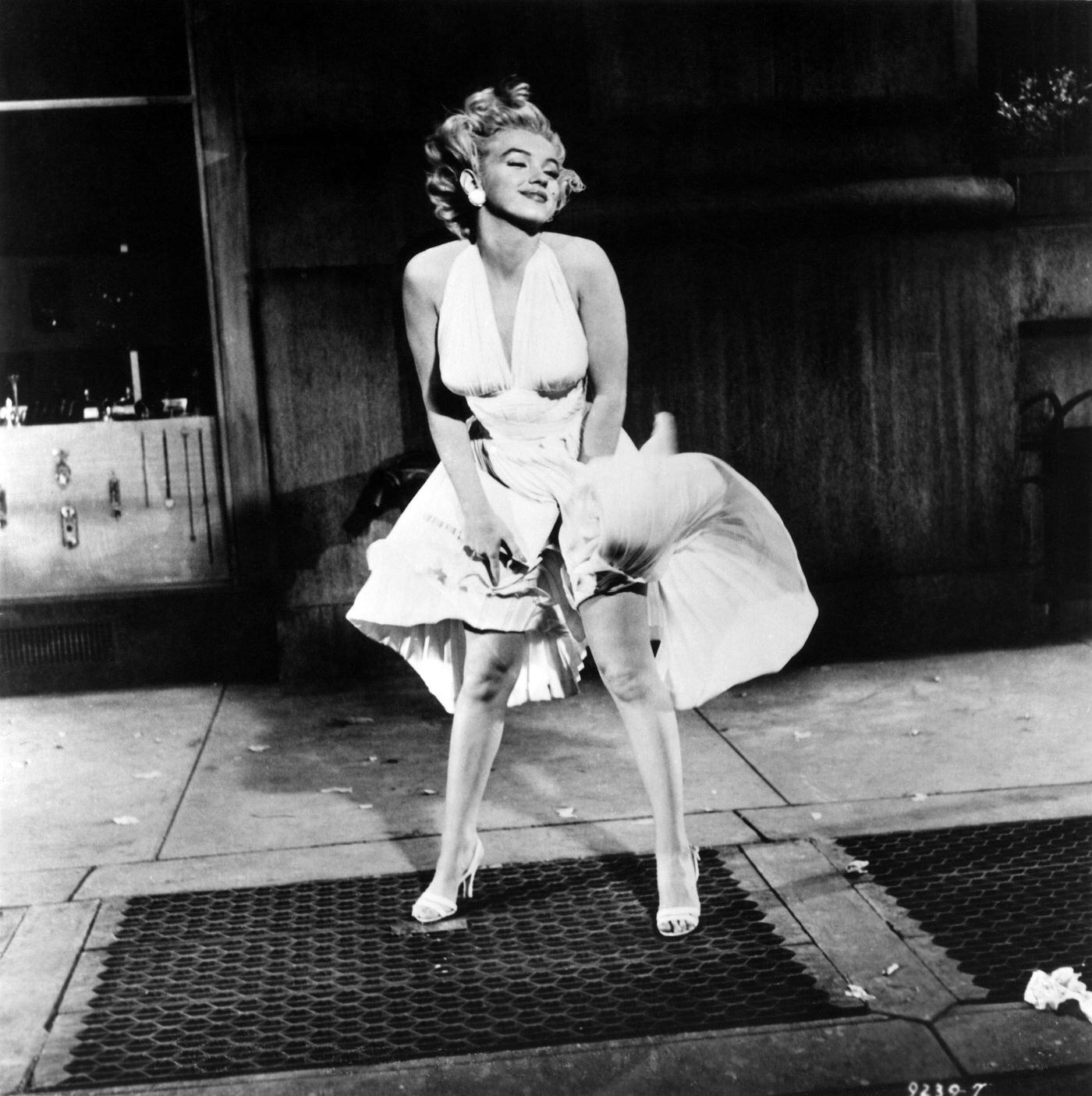 Marilyn Monroe With The Skirt Of Her White Dress Blowing As She Stands Over A Subway Grate On Set In 1954 During The Filming Of &Amp;Quot;The Seven Year Itch&Amp;Quot; In Los Angeles