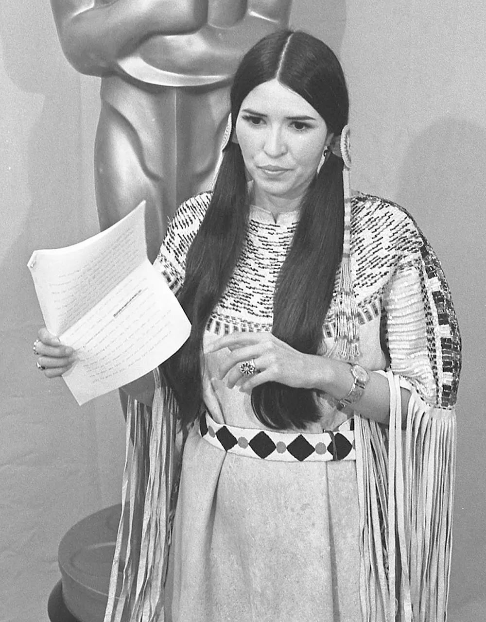 Sacheen Littlefeather Holds A Statement From Marlon Brando Refusing The Academy Award For Best Actor.