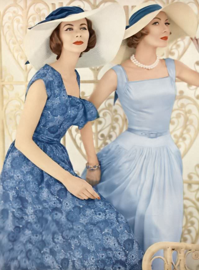 Joan Friedman And Jessica Ford In Pretty Thin-As-Air Cotton Shiffon Dresses By Mollie Parnis, Hats By Emme, Vogue, December 1, 1956