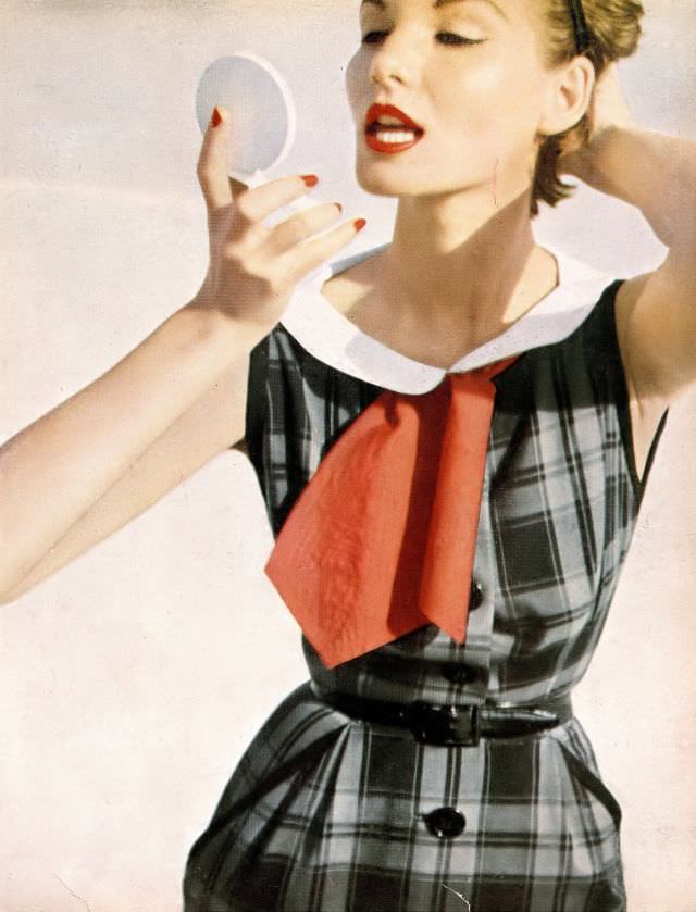Cherry Nelms In Black And Gray Plaid Cotton Dress With White Piqué Collar And Black Patent Leather Belt By Mollie Parnis, May 1953