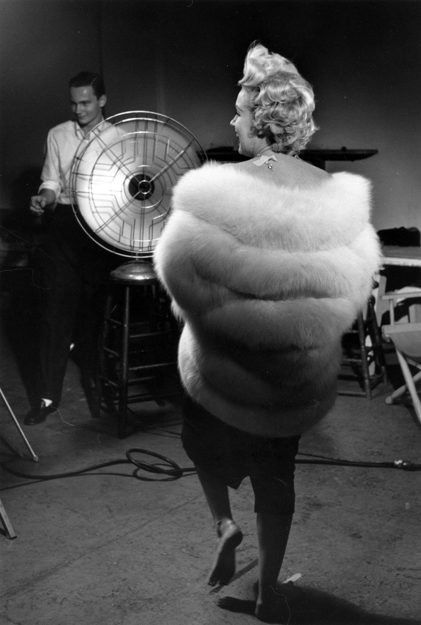 Marilyn Monroe Wearing A White Stole Fur Wrap Prepares For A Publicity Photo Shoot With Richard Avedon In His Studio In 1954 During The Filming Of &Amp;Quot;The Seven Year Itch&Amp;Quot; In New York
